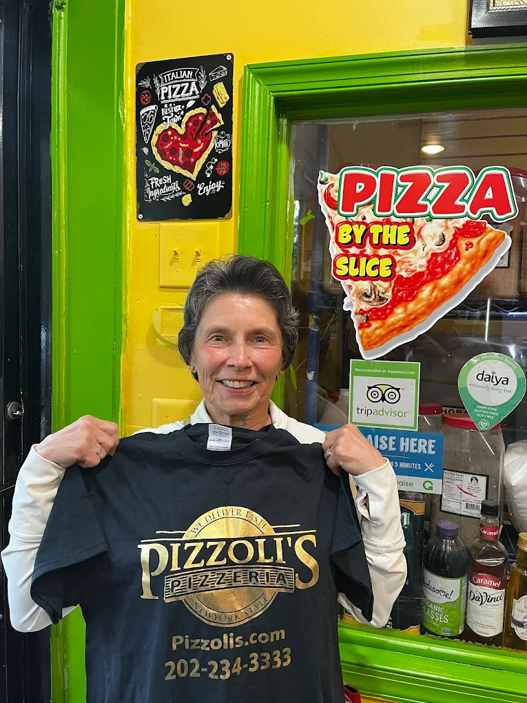 Pizzolis Pizzeria t-shirt at the storefront