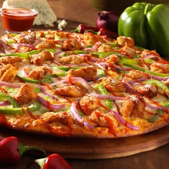 Buffalo chicken pizza with green peppers and red onion