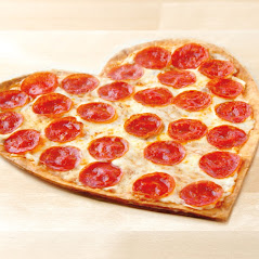 Heart-shaped pepperoni pizza